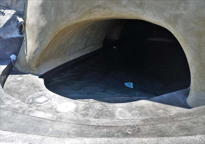 The heated cave pool has a small waterfall inside.