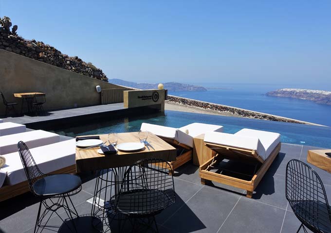 Throubi Restaurant opens onto a terrace with an infinity pool that oversees the caldera.