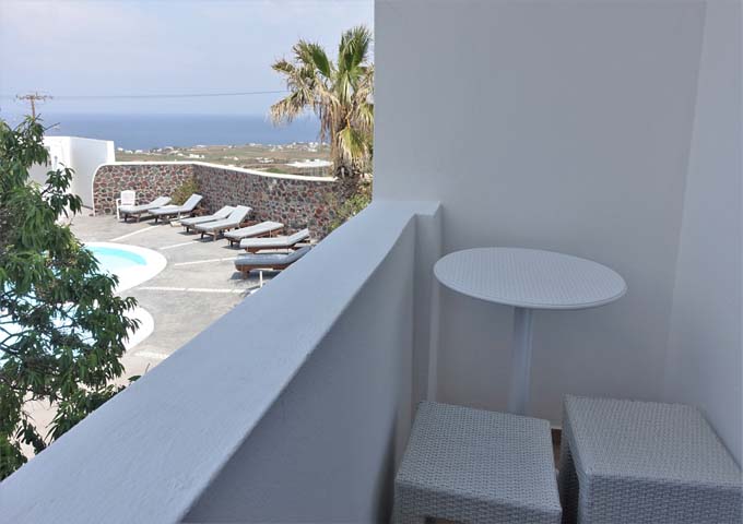 The Double Room has a small balcony with sea and pool views.