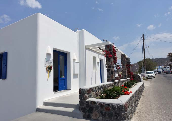 The reception is on the main Oia road leading to Fira and the port.
