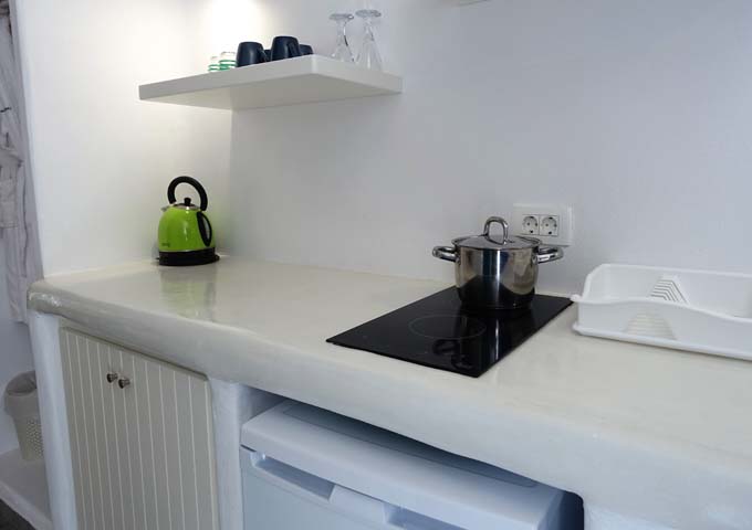 The studios have a small well-equipped kitchenette with a stove.