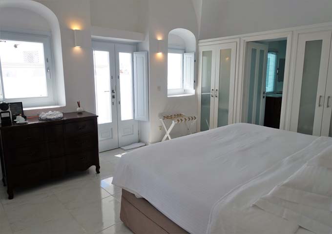 The suite's bedroom opens onto a terrace.