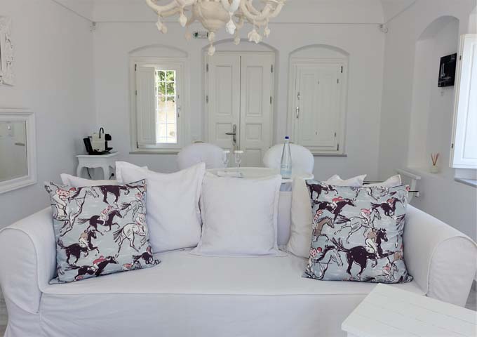 The Presidential Suite decor is Cycladic with a traditional Greek color palette.