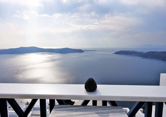 The private balcony offers great caldera views.
