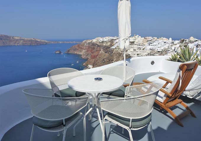 The terrace has an al fresco dining area, sun-lounger and futon.