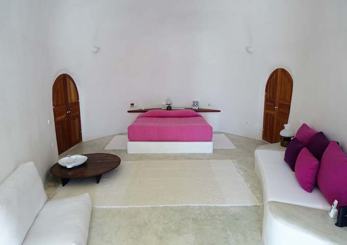 The main bedroom of the New Perivolas Suite has a king bed.