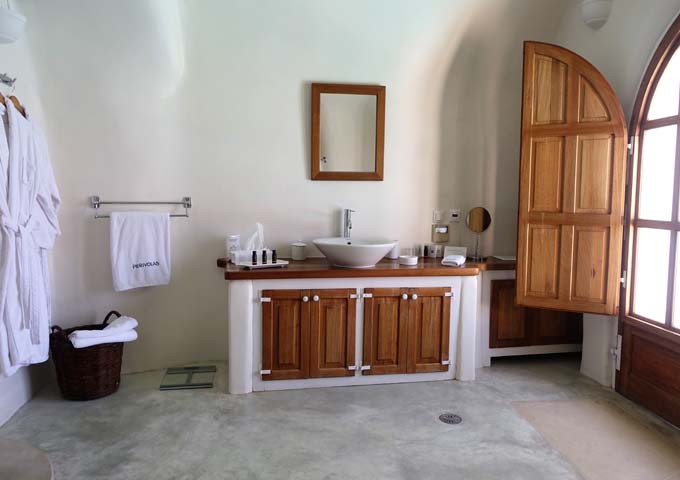 The suite features a large vanity area with a big sink.