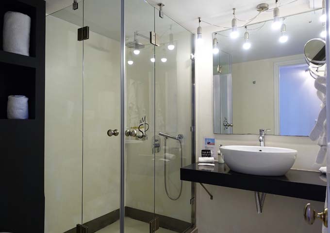 Bathroom are spacious and well-lit.