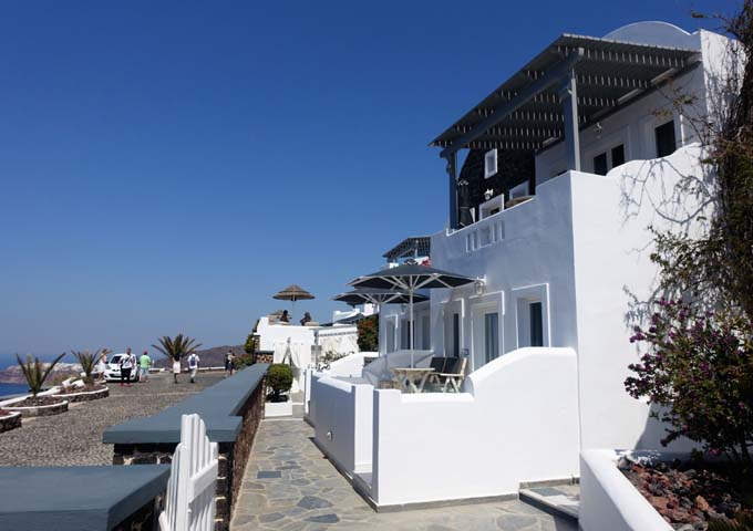 The exterior of the hotel features cobblestone paths.