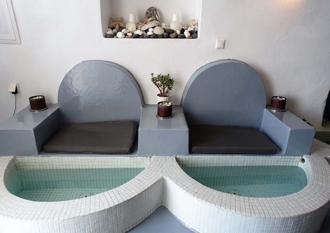 The spa has 2 unique cave-tyle soaking chairs.