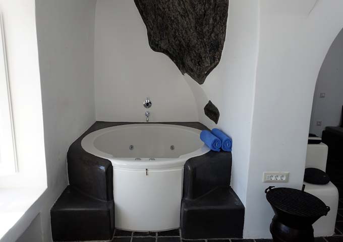 The villa's indoor jacuzzi has its own small niche.