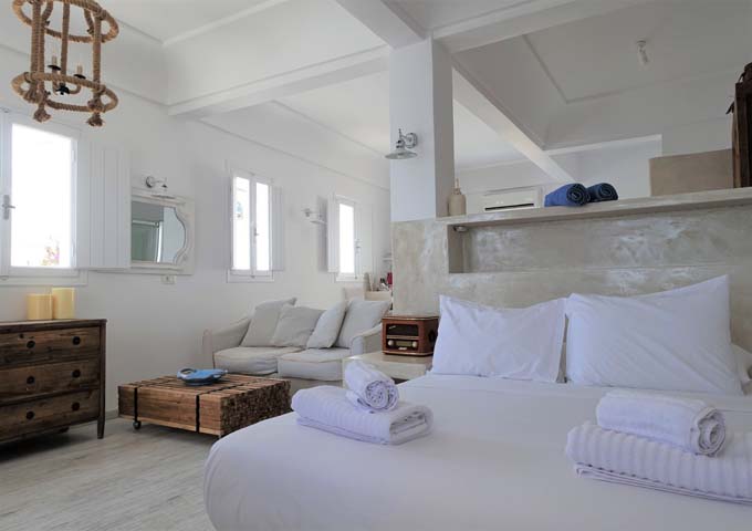 The bed and living areas of the villa face the terrace.