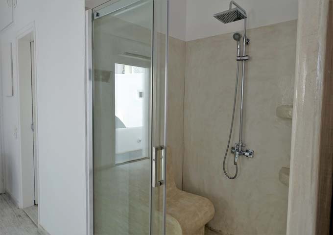 The glass shower is a unique feature of the villa.
