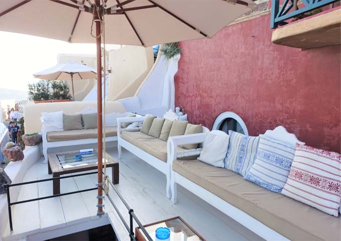 The shared balcony has plenty of seating and some shade.