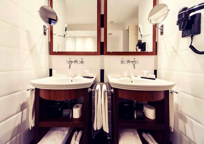 The Canal View Suite bathrooms have twin sinks.