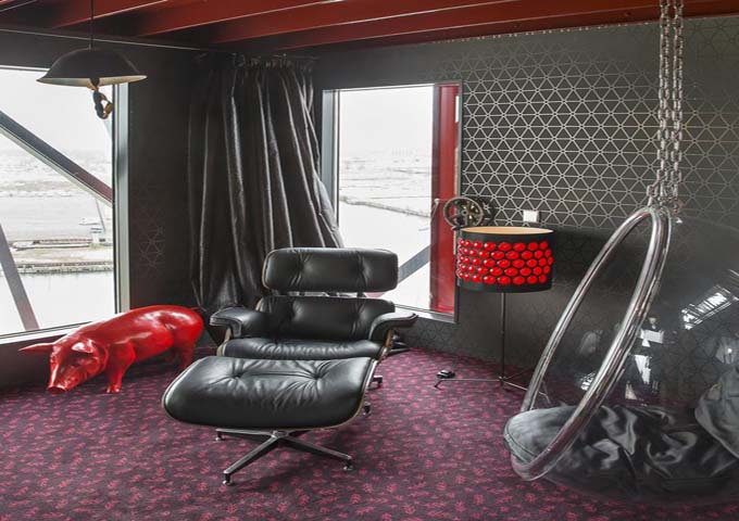 The living area of the Mystique Suite features designer furniture.