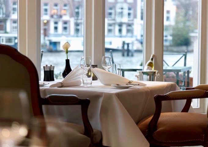 The in-house La Rive restaurant serves elegant French-Mediterranean cuisine.