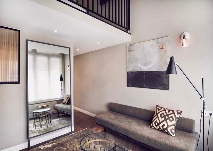 The living areas of multi-level Deluxe rooms are bigger.