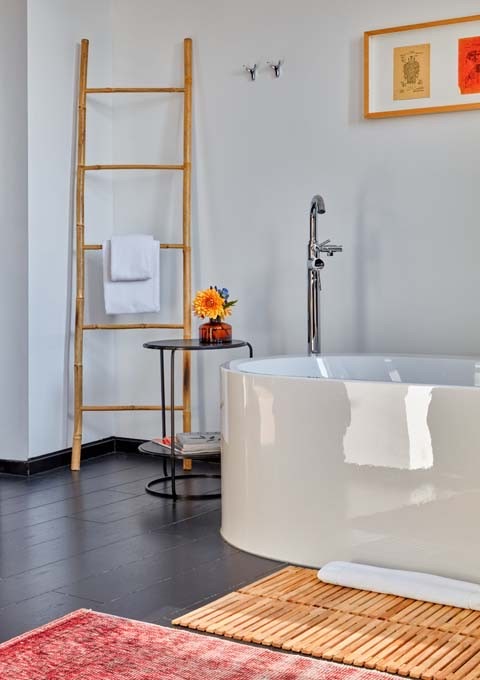Sir Suite bathrooms boast of Philippe Starck tubs.