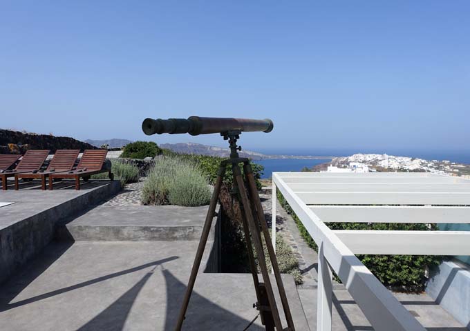 The pool deck also has an antique telescope.