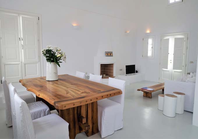 Villas have wooden furniture and a fireplace.