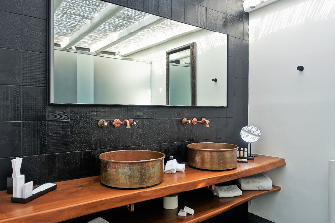 The Honeymoon Suite's bathroom is comfortable for couples with its dual vanity.