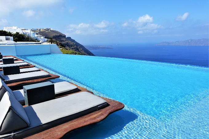 The pool has floating sun loungers and Bali beds.