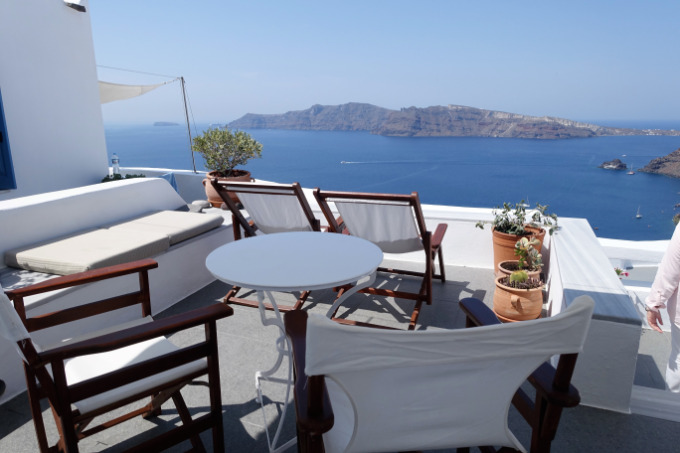 The apartment terraces are well-furnished and offer great caldera views.