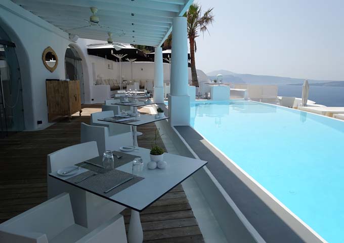 Anthos Restaurant's outdoor dining area is by the pool.