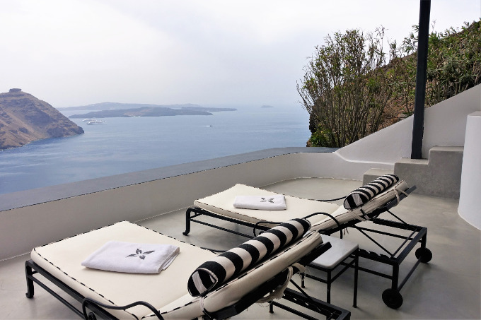 The sun loungers offer great views of the caldera, volcanoes, Akrotiti and Aspronisi Island.