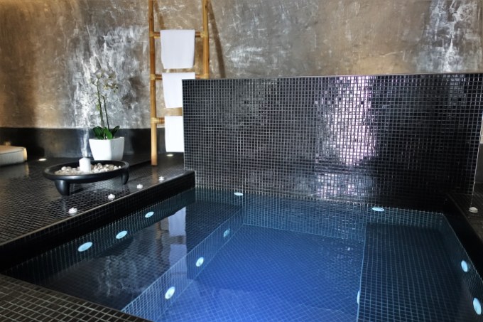 The spa's jacuzzi and lounge are spacious enough for 2.