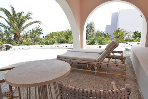 The Dorian Suite's balcony/patio has al fresco dining and loungers.