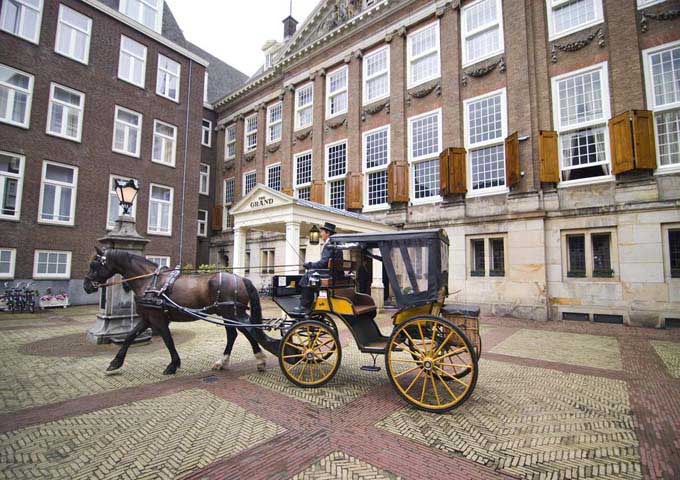 The hotel offers horse-drawn carriage rides to its guests.