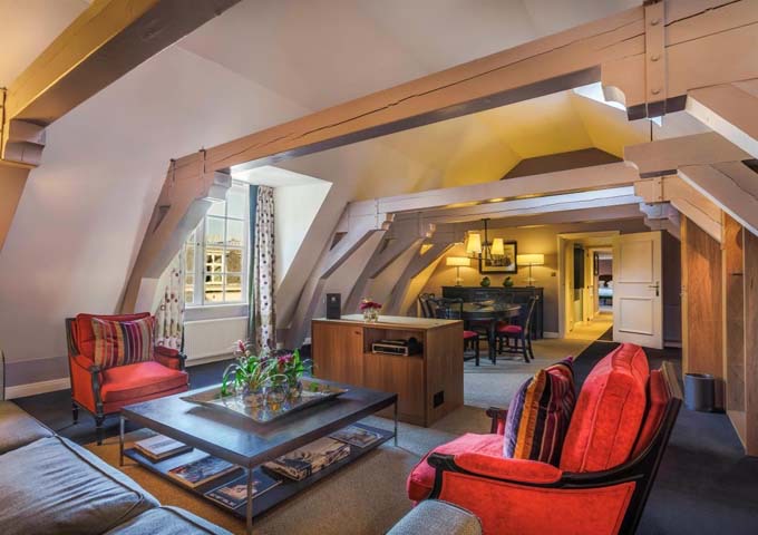 The Royal Suite features heavy wooden beams and courtyard views.