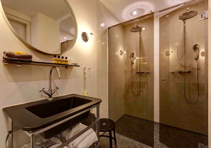V Comfort Rooms feature twin rain showers, and some even have a bathtub.