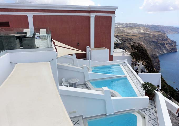 Pool Suites feature private pools and small al fresco dining tables.