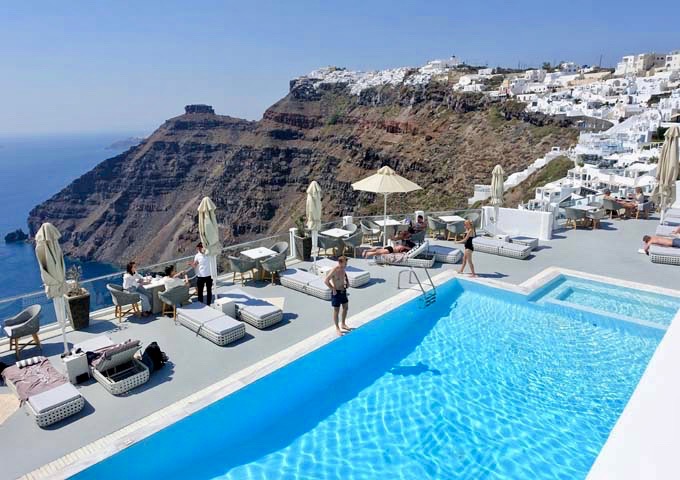 The pool and terrace offer amazing caldera views.