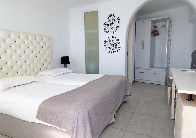 Rooms have a contemporary decor with Cycladic design elements.
