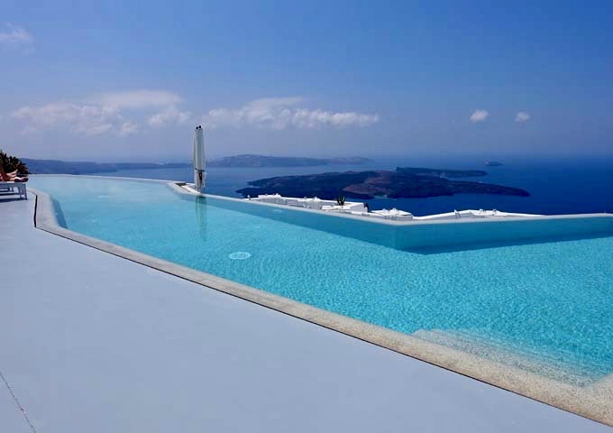 The hotel's infinity pool is the largest in the caldera.