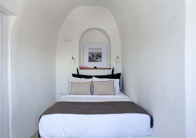 The second bedroom is cave-style and small.