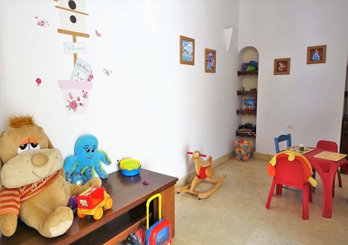 The playroom is well-equipped, and also features pool toys.