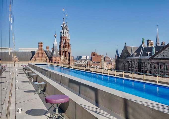 The rooftop WET Deck with infinity pool overlooks the Royal Palace.