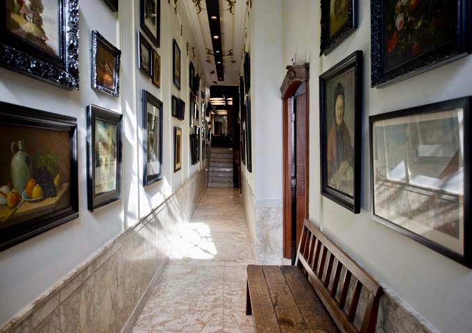 The entry hall is adorned with Dutch Masters' reproductions.