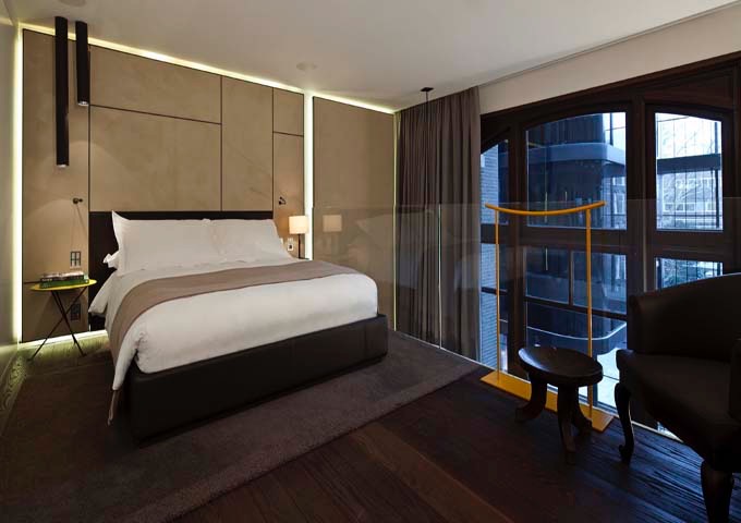 Deluxe Duplex rooms feature beds on the mezzanine level.