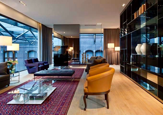 Penthouse Suite's living area is decorated with art and porcelain.