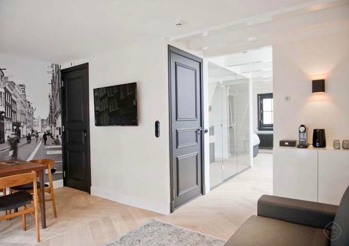 Reestraat suite features a private staircase access and spacious living area.