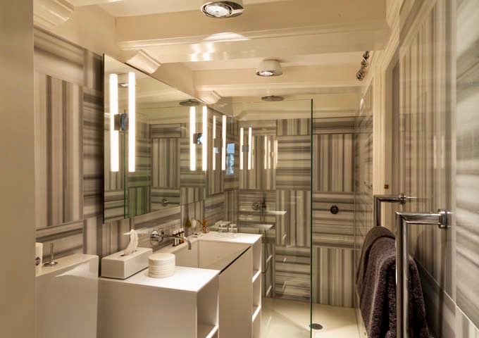 All bathrooms are spacious and feature walk-in showers.