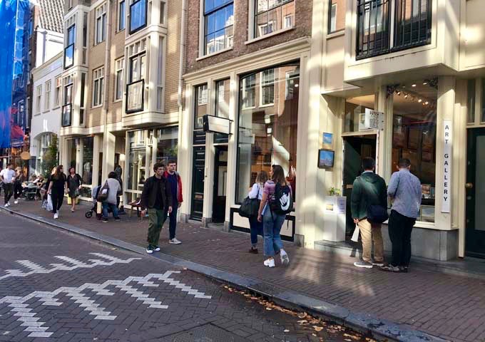 Dutch Accent Gallery sells watercolor city scapes by local artists.