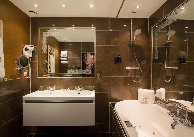 Most bathrooms have a bath-and-shower combo.