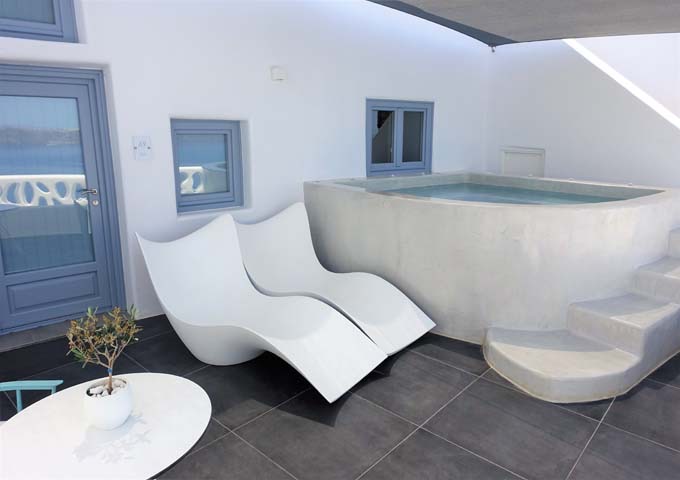 The Cave Suite has a balcony with a private jacuzzi.